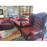 Three Piece Chesterfield Suite to Include Wing Back Arm Chair on Queen Anne Supports