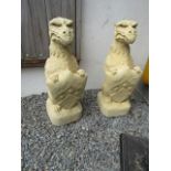 Pair of Sandstone Classical Griffins with Shield Motif Decoration Each Approximately 30 Inches High