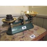 Antique Brass Shop Scales with Accompanying Weights15 Inches Wide x 8 Inches High