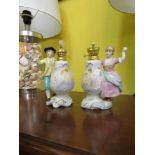 Pair of Neat Form Oil Lamps of Figures in Traditional Dress Each 7 Inches High Approximately