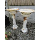 Pair of Cast Iron Pedestal Urns on Slender Fluted Bases Each 40 Inches High One Photographed