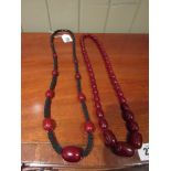 Two Antique Amber Bead Necklaces One with Beaded Hair