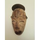 African Carved Mask with Polychrome Detailing