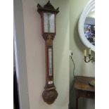 William IV Well Carved Wall Barometer with Inscribed Enamel Dials above Further Carved and Rosette