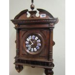 Antique Wall Clock with Roman Numerical Decorated Dial Panels 18 Inches High Approximately