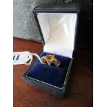 Sapphire and Diamond 9 Carat Gold Contemporary Ring with Oval Cut Centre Stone