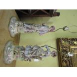 Pair of Figural Porcelain Table Lamps Upon Floral Bases with Brass Fittings