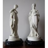 Pair of Antique Bisque Figures of Classical Maidens from Antiquity Rest on Circular Hardwood Bases