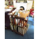 Antique Marquetry Decorated and Cossbanded Mahogany Revolving Open Form Bookcase with Center