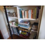 Three Shelves of Various Books As Photographed