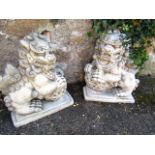 Pair of Composite Stone Fo Dogs Each 16 Inches High Approximately
