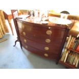 Regency Mahogany Bow Front Chest of Four Long Drawers with Pull Out Writing Slide above Embossed