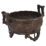 A BRONZE 'BAMBOO' TRIPOD CENSER, QING DYNASTY, 18TH / 19TH CENTURY circular, the three legs as