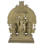 A BRASS SHRINE DEPICTING VIRABHADRA, WESTERN DECCAN, CIRCA 18TH CENTURY cast in five sections, the