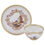 A MEISSEN TEABOWL AND SAUCER, CIRCA 1735-40 painted with harbour scenes in shaped quatrelobed panels