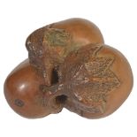 A JAPANESE PALE BOXWOOD NETSUKE OF THREE AUBERGINES BY MASANAO OF YAMADA, LATE EDO PERIOD, CIRCA