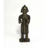 A SMALL BRONZE FIGURE OF DEVI, WESTERN INDIA, CIRCA 18TH CENTURY standing on a square base, her