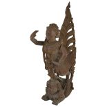 TWO CARVED WOOD FRAGMENTS, BURMA, CIRCA 1900 the larger in the form of a kinnara riding on a