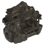 ˜A JAPANESE EBONY NETSUKE OF A MOUNTAIN RETREAT, LATE EDO PERIOD, CIRCA 1850 unsigned, but