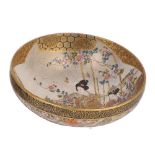 A JAPANESE SATSUMA BOWL, MEIJI PERIOD (1868-1912) painted to the interior with a mother and three