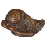 ˜A JAPANESE WOOD NETSUKE OF A SNAIL ON LOTUS LEAF, LATE EDO PERIOD, CIRCA 1820 with added