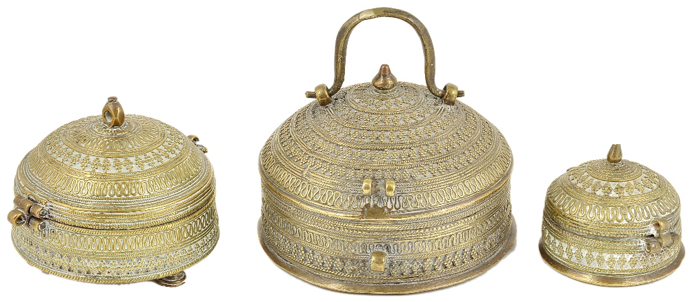 TWO BRASS BOXES, INDIA, 19TH CENTURY each of elongated octagonal form, with domed lid, one with