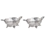 A PAIR OF GEORGE V SILVER SWEETMEAT BASKETS, GARRARD & CO. LTD., LONDON, 1912 oval, the ogee sides