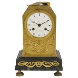 A FRENCH GILT-BRONZE MANTEL CLOCK, MID 19TH CENTURY Empire style, of plinth form with canted sides
