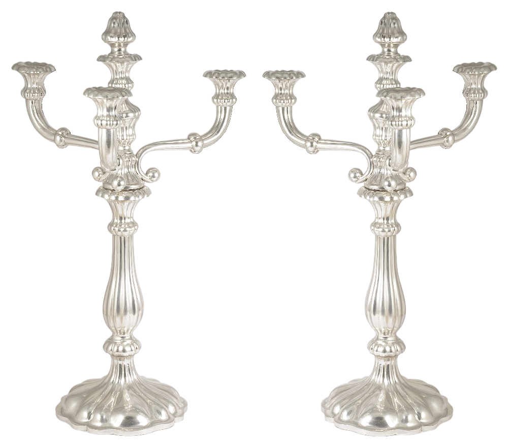 A PAIR OF AUSTRIAN SILVER FOUR-LIGHT CANDELABRA, JOSEF WEININGER, VIENNA, 1855 fluted circular bases