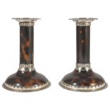A PAIR OF VICTORIAN SILVER AND TORTOISESHELL CANDLESTICKS, WILLIAM COMYNS & SONS, LONDON, 1889 the