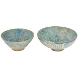 TWO TURQUOISE-GLAZE BOWLS, PERSIA, 13TH/14TH CENTURY underglaze painted fritware, the larger with