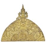 A MONUMENTAL COPPER GILT AUREOLE FROM A SHRINE, NEPAL, 18TH/19TH CENTURY of arch shaped form, made