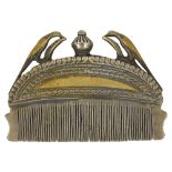 A PARCEL GILT SILVER COMB, INDIA, CIRCA 19TH CENTURY of crescentic form, the hollow body forming a
