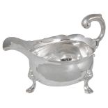 A GEORGE II SILVER SAUCEBOAT, JOHN POLLOCK, LONDON, 1748 the oval body engraved with a coat of