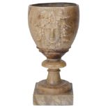 AN ALABASTER VASE, ITALIAN, 19TH CENTURY in the form of a large goblet, the bowl carved with a