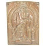 A COPPER REPOUSSE VIRABHADRA PLAQUE, DECCAN, SOUTHERN INDIA, 19TH CENTURY of rectangular form, the