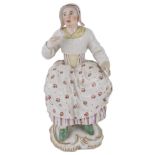 A FRANKENTHAL FIGURE OF A MAID, CIRCA 1760 modelled seated and holding a rolled-up letter in her