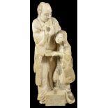 ˜A JAPANESE IVORY OKIMONO OF A SCHOLAR, MEIJI / TAISHO PERIOD (1868-1926) carved standing beside his