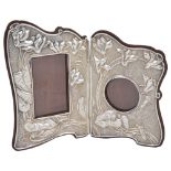 AN EDWARDIAN SILVER ART NOUVEAU DIPTYCH PHOTOGRAPH FRAME, E. MANDER & SON, BIRMINGHAM, 1907 the