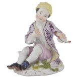 A MEISSEN FIGURE OF A BOY WITH FISH, CIRCA 1750-55 modelled sitting on the ground holding a fish