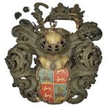 A CARVED POLYCHROME WOOD ARMORIAL BEARING, CONTINENTAL, LATE 17TH / EARLY 18TH CENTURY the shaped