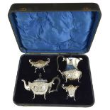 A VICTORIAN SILVER FOUR-PIECE TEA SET, JAMES DEAKIN & SONS LTD. AND H. MATTHEWS, CHESTER AND