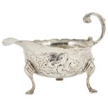A GEORGE II SILVER CREAM BOAT, DAVID HENNELL, LONDON, 1751 oval, with contemporary chasing of