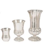 THREE AUSTRO-HUNGARIAN SILVER BEAKERS, VIENNA, 1844?/1856 AND CIRCA in three sizes, fluted, chased