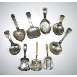 ˜A COLLECTION OF SEVEN SILVER CADDY SPOONS, VARIOUS MAKERS INCLUDING JOSEPH WILLMORE AND COCKS &