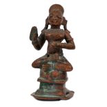 A BRONZE FIGURE OF A YOGI, BENGAL, EASTERN INDIA, 18TH/19TH CENTURY seated on a raised lotus, his