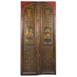 A PAIR OF PAINTED WOOD DOORS, PROBABLY RAJASTHAN, INDIA, 19TH CENTURY in Mughal style, carved on one