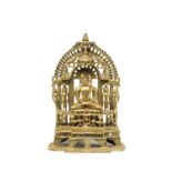 A JAIN BRASS SHRINE, WESTERN INDIA, DATED SAMVAT 1487/1431 A.D. probably depicting Chandraprabha,