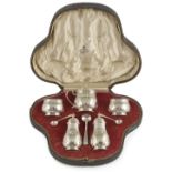 A GEORGE V SILVER FIVE-PIECE CONDIMENT SET, E.S. BARNSLEY & CO., BIRMINGHAM, 1913 in early 18th