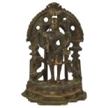A BRONZE SHRINE DEPICTING BHAIRAVA, WESTERN INDIA, 16TH CENTURY the four-armed deity standing on a